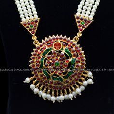 Original Design by Classical Dance Jewelry® ❥ Pearl Kempu moti mala Long Haram Chain is traditional and ethnic South Asian Indian Jewelry. ❥ Traditional Padakkam Peacock Style Pendant Pearls Kempu and white stone Long Necklace ❥ You Can wear this set for Bharatnatyam Kuchipudi Dance Performances, Engagement, Weddings, Birthdays, festivals, puja, Ammavaru Amman decorations, Durgamata Decoration ❥ Handmade Indian Traditional Item. ❥❥❥ Set has variations please CHECKOUT Variants ☛ Long Necklace wit Multicolor Temple Necklace For Rituals, Multicolor Temple Necklace With Zari Work For Festivals, White Temple Jewelry Mala For Puja, Traditional White Mala For Puja, Traditional Necklaces For Festivals And Ceremonies, Traditional White Temple Necklace For Festive Occasions, Festive Temple Necklace With Round Beads For Rituals, White Temple Jewelry Bridal Necklace For Puja, Multicolor Chandbali Temple Necklace For Puja