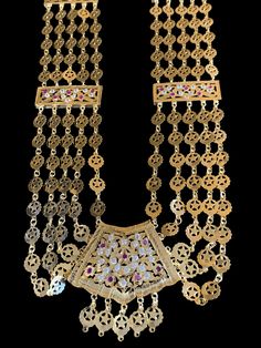 chandan haar made using 22ct gold plated motifs cz polki length of the necklace 14 inch , back chain length on each side is 5 inch width of necklace 2.2 inch Ceremonial Gold Kundan Necklace With Stone Work, Ceremonial Gold Kundan Necklace Hand Set, 22k Gold Meenakari Temple Necklace For Rituals, 22k Gold Tilla Temple Necklace For Celebrations, Gold Plated Bollywood Temple Necklace With Intricate Design, Festive Gold Temple Necklace With Stone Work, Bollywood Style Gold-plated Tilla Necklace, Traditional Long Temple Necklace With Intricate Design, Traditional Gold Temple Necklace With Stone Work