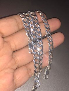 This men’s 6mm-wide diamond-cut solid Cuban link chain necklace crafted in sterling silver measures 22.0 inches in length and secures with a lobster claw clasp. Not plated not cheap not hollow Not refundable Last set Unbeatable Huge sale Comes with certificate of authenticity card Beautiful gift wrapping included Led box included Best gift Hurry don’t miss out! Ready to ship today Bracelet and chain included! Sterling Silver Cuban Link Jewelry With Lobster Clasp, Sterling Silver Cuban Link Necklace Gift, Silver Cuban Link Necklace Gift, Silver Cuban Link Necklace As Gift, Silver Cuban Link Necklace With Figaro Chain As Gift, Silver Cuban Link Necklace With Curb Chain As Gift, Sterling Silver Chain Link Jewelry As A Gift, Chain Link Jewelry With Sterling Silver Clasp As Gift, Sterling Silver Chain Link Jewelry Gift