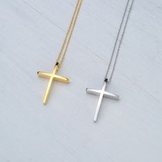 Minimal solid gold handmade cross necklace, curved 14k solid gold cross pendant. This is a beautiful handmade minimal cross with a curved front that makes it a bit different and unique. Available in 14k yellow and 14k white gold , please make your choice from the drop down menu. Minimal cross necklace, unisex pendant. Size: 1,7 cm / 0.7 inches long and 0.7 cm / 0,3 inches wide Material: 14k solid yellow gold or 14k solid white gold You can choose the charm with a yellow gold filled chain (white Minimalist Cross Pendant Necklace As Gift, Minimalist Yellow Gold Cross Necklace Gift, Minimalist Crucifix Necklace As A Gift, Minimalist Crucifix Necklace For Gift, Minimalist Cross Pendant Necklace For Gift, Minimalist 14k Gold Cross Necklace As Gift, Minimalist Cross Necklace Gift, Yellow Gold Pendant Cross Necklace For Gift, Yellow Gold Cross Pendant Necklace Gift