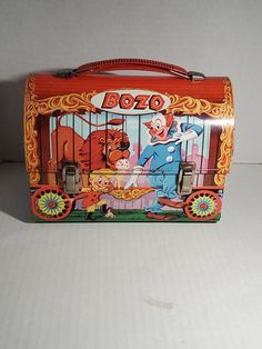 This is a vintage 1963 Bozo the Clown metal lunch box. There is no thermos. There's some minor paint wear on the inside interior and also on the outside. There is remains of a yellow sticker inside the lunch box on the left. This lunchbox looks very good being 61 years old. Clown Vintage, Bozo The Clown, Franklin Nc, Mothers Love Quotes, Inside Interiors