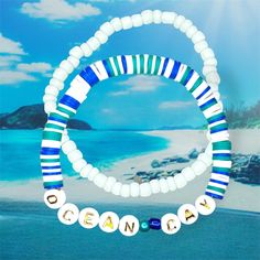 Dive into the cruise spirit with our Ocean Cay-inspired bracelets! Perfect for beach lovers and cruise enthusiasts alike, these handmade accessories capture the essence of tropical getaways. Features: Colorful disc beads in shades of blue, green, and white, reminiscent of ocean waters "OCEAN CAY" spelled out in letter beads with gold detailing Adorable white sea turtle charm Stretchy design for comfortable wear Each version comes with a white seed bead bracelet accompanying bracelet of your choice. Variations: Classic Ocean Cay: Blue, green, and white disc beads with "OCEAN CAY" lettering Heishi Style: Flat disc beads in ocean-inspired colors and gold. Multicolor Ocean: Vibrant mix of blue, green, and teal beads and white disc beads with "OCEAN CAY" lettering. Pastel Paradise: Soft-colored Beach Vacation Accessories, Inspired Bracelets, Msc Cruises, Turtle Charm, Seed Bead Bracelet, White Sea, Tropical Getaways, Cruise Line, Letter Beads