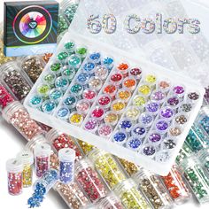 a box filled with lots of different colored beads next to a package of glitters