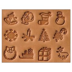 a set of twelve christmas themed cookie molds