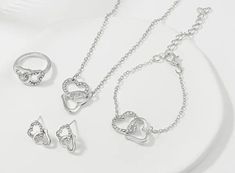 5 Piece Jewelry Set Silvery,Hearts *Stunning* Matching Ring,Necklace,Earrings, Bracelet. New Shipped From USA. Fast And Descreet Shipping. This Can Make A Nice Gift For Your Partner. Gift Wrapping And Note Is Available upon Request For No Additional Charge! Silver Heart Jewelry Sets For Anniversary, Valentine's Day Silver Jewelry Sets With Heart Cut, Valentine's Day Gift Sterling Silver Jewelry Sets, Silver Heart Jewelry Sets For Party, Valentine's Day Sterling Silver Jewelry Sets, Silver Heart-shaped Jewelry Sets For Anniversary, Silver Heart-shaped Jewelry Sets For Party, Silver Heart-shaped Metal Jewelry Sets, Silver Heart-shaped Jewelry Sets For Valentine's Day