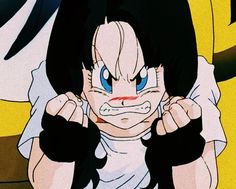 an anime character with blue eyes and black hair, holding his hands to his ears