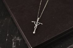 Sterling Silver Clavicle Chain Crucifix Jewelry, Sterling Silver Crucifix Clavicle Chain, Elegant Silver Crucifix Necklace, Classic Silver Crucifix Necklace, Sterling Silver Crucifix Jewelry For Wedding, White Gold Crucifix Necklace With Silver Chain, Sterling Silver Crucifix Necklace With Silver Chain, White Gold Sterling Silver Cross Necklace For Wedding, White Gold Crucifix Necklace For Formal Occasions