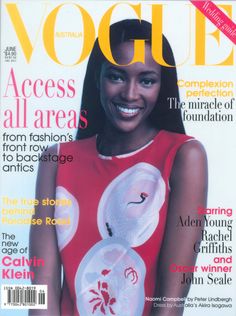 a woman is smiling on the cover of a magazine, wearing a red top and black pants