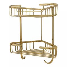 a gold metal shower caddy with two shelves on each side and one shelf attached to the wall