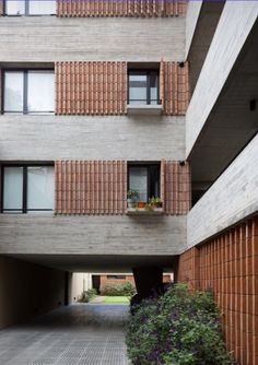 an apartment building with several balconies and windows