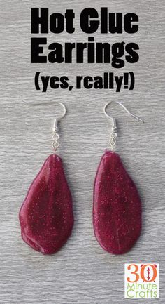 the earrings are red with glitter on them and have silver earwires that read hot glue earrings yes really