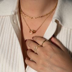 Our 14K Gold-Filled Interlocking necklace is a beautiful sentiment between loved ones, best friends, or mother and child. The charm pendant adds an elegant touch, and the intricate details will make you feel like your look is complete! - 14k gold-filled- Chain width: 2.5 mm.- Small circle 9mm, Large circle: 12.6mm- Chain length: 16" + 2" extension- Waterproof, Tarnish resistant & Hypoallergenic Delicate Gold Plated Charm Necklace For Anniversary, Elegant Link Charm Necklaces For Gifts, Elegant Link Charm Necklace For Gift, Gold Plated Charm Necklaces With Delicate Chain For Anniversary, Gold Plated Charm Necklace With Delicate Chain For Anniversary, Anniversary Gold Plated Charm Necklace With Delicate Chain, Delicate Gold Chain Necklace For Anniversary, Anniversary Gold-plated Charm Necklace With Delicate Chain, Delicate Gold-plated Jewelry For Mother's Day