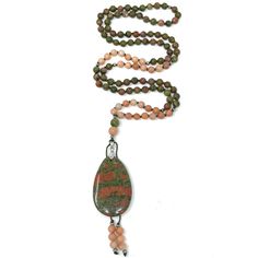 Enjoy this hand-knotted mala necklace made with natural unakite & pink aventurine gemstonesUnakite brings together the abundant, nurturing energy of green with the soft, caring passion of pink in one of nature’s most healing crystals of the heart and mind. It resonates with the frequency of love, compassion and kindness, and is a stone dedicated to balancing the emotional body. Combine the MALA necklace with the bracelet to accentuate your look: Unakite & pink aventurine bracelet The Mala neckla Spiritual Ocean Jasper Necklaces For Healing, Jasper Natural Stones Necklace For Meditation, Pink Aventurine, Aventurine Bracelet, Knotted Mala, Emotional Body, Mala Necklace, Heart And Mind, Healing Crystals