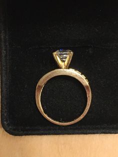 This is a lovely hardly worn cubic zirconia ring. This ring had a center stone that is the size of a 1carat diamond but is a brilliant cubic zirconia. 26 brilliant cubic zirconia flank the sides . This ring can be worn as an engagement ring or a dinner ring . Or wear it when you are on vacation and don't want to worry about your jewelry. Sparkling and beautiful. Inside marked 14kt cz. This is a high quality piece of jewelry. Size 5 14k Gold Emerald Ring With Vs Clarity, Dazzling Yellow Gold Sapphire Ring With Brilliant Cut, Gold Emerald Ring With Vs Clarity In 14k Gold, Cubic Zirconia Promise Ring With Brilliant Cut, Cubic Zirconia Rings With Brilliant Cut For Promise, 14k Gold Asscher Cut Ring With Center Stone, Cubic Zirconia Fine Jewelry For Wedding Proposal, Emerald Ring Brilliant Cut For Proposal, Fine Jewelry For Proposal With Cubic Zirconia