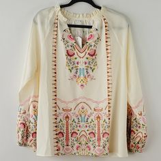 Botanica Blouse Top Longsleeve Embroidered V-Neckline Elastic Cuff Sleeve Color Cream Multicolor Size Large Brand New Without Tag Inventory# D220 Measurements Approx Length 26" Chest 21.5" Bohemian V-neck Blouse With Embroidered Hem, Folk Style V-neck Blouse With Embroidered Neckline, Spring Folk Style V-neck Peasant Top, Spring Split Neck Blouse For Brunch, Feminine Embroidered V-neck Blouse, Spring Bohemian Blouse With Embroidered Hem, Spring Bohemian Top With Embroidered Hem, Floral Embroidered V-neck Blouse For Vacation, Bohemian V-neck Blouse With Multicolor Embroidery