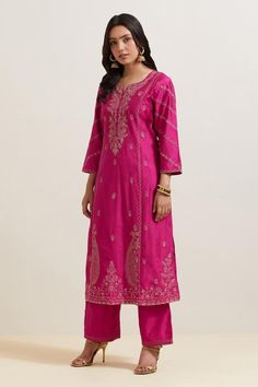 Pink natural weaves chanderi silk kurta with contrast paisley and floral embroidery. Comes with pant and shimmer organza dupatta.
Components: 3
Pattern: Embroidered
Type Of Work: Floral and Paisley
Neckline: Notched
Sleeve Type: Three Quarter
Fabric: Chanderi Silk, Shimmer Organza
Color: Pink
Other Details: 
Embroidered hem pant
Fringed border dupatta
Occasion: Puja - Aza Fashions Embroidered Hem, Women Kurta, Natural Weave, Silk Kurta, Straight Kurta, How To Hem Pants, Organza Dupatta, Pink Paisley, Womens Tunics