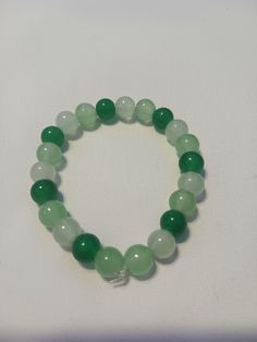 Green lime bracelet Green Glass Bead Bracelet, Elegant Green Stretch Bracelet With Round Beads, Casual Jade Beaded Bracelets Gift, Trendy Green Bracelets For Friendship, Casual Jade Beaded Bracelet Gift, Green Crystal Bracelet With Round Beads And Adjustable Fit, Green Adjustable Crystal Bracelet With Round Beads, Casual Green Crystal Bracelet With Round Beads, Adjustable Green Crystal Bracelet With Round Beads