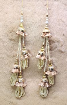 Indian Handmade Beaded Lahenga Latkan Tassels for Saree HandBags Hangings Dupatta Bridal Wedding dress for Women pair of 2 pcs Size - 30 cm Length  Item Description You can use this Beautiful pair of tassle for several DIY projects.  *These beautiful Tassel Latkans are used as the accessory for Lahenga and saree , but u can use according to your need and your innovative ideas. * Package contains 2 Latkan / 1 Pair you can use these latkans in various ways Craft Projects Designing Home Decoration Festive celebrations. Evening and party Apparels. Home décor items Apparel & Fashion Table cover, curtains, Pillow covers, Cushion cover Table cover, curtains Designing stylish blouses Ship From New Delhi, India 2 Latkan / 1 Pair Tassel Dupatta Designs, Cheap Festive Hoop Earrings With Latkans, Dupatta Tassels, Luxury Chandelier Earrings With Latkans For Formal Occasions, Luxury Women's Saree With Latkans, Luxury Chandbali Danglers With Latkans, Luxury Chandbalis With Latkans As A Gift, Luxury Traditional Wear With Latkans For Women, Tassels For Dupatta