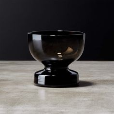 a black bowl sitting on top of a table