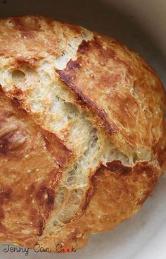 a loaf of bread sitting on top of a white plate