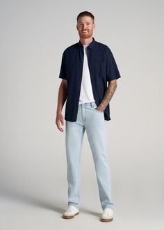 About Our Tall Straight Leg Jeans The OG denim fit in a length that fits your frame. Straight leg jeans for tall men are a must-have in every guy's closet and were one of the original denim styles in the mid-1900s (think James Dean and John Wayne). While jeans have been around for ages, finding options for tall guys has always been a struggle – until now. All of our men's tall jeans are designed specifically for guys between 6'3” and 7'1”. This pair has a bit more room in the hips and thighs wit Tall Guys Aesthetic Outfits, Men Casual Jeans Outfits, Men Navy Outfit, Style For Tall Guys, Shirt And Jeans Outfit For Men, Straight Cut Pants Outfit Men, Smart Ankle Pants Outfit Men, Washed Denim Jeans Outfit, Washed Jeans Outfit Men