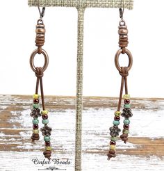 Bohemian Brown Beaded Nickel-free Earrings, Nickel-free Brown Beaded Earrings For Festival, Adjustable Brown Beaded Earrings For Festival, Adjustable Bohemian Brown Beaded Earrings, Adjustable Wire Wrapped Brown Earrings, Adjustable Brown Wire Wrapped Earrings, Bohemian Brown Wire Wrapped Beaded Earrings, Adjustable Southwestern Brown Earrings, Southwestern Brown Dangle Beaded Earrings