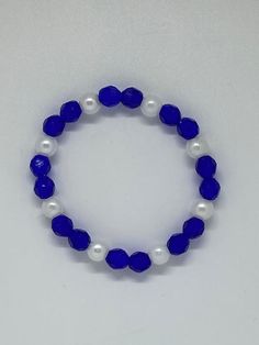 Elegant Blue Faceted Beaded Bracelets, Elegant Blue Faceted Beads Bracelet, Elegant Blue Crystal Bangle Bracelet, Elegant Blue Beaded Bracelets With Faceted Beads, Elegant Blue Beaded Bracelet With Faceted Beads, Blue Faceted Crystal Bracelets, Blue Crystal Bracelet With Faceted Beads, Elegant Adjustable Blue Crystal Bracelet, Elegant Blue Beaded Crystal Bracelet