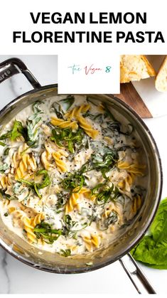 vegan lemon florentie pasta in a pan with spinach leaves on the side