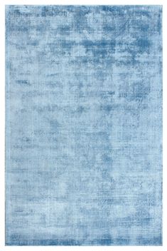 a blue rug with faded edges