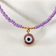 Purple Evil eye pendant necklace 💜🧿 . . . Shop Online | AlinaEspinal.com | 🛍 . . #beadedjewelry #necklace #beaded #beadedjewelryofinstagram #beadednecklace #beadedbracelets #etsy #etsyshop #etsyjewelry #choker #evileyejewelry #uniquenecklace #beadedaccessories #lovejewelry #evileyebracelets #bisutería #bisuteria #jewelryaddict #handmade #jewelryfindings #fashionjewelry #jotd #brooklynbridge #protectionjewelry #manhattan #purple💜 #purplejewelry #purpleloverscommunity #purplelovers #newyork Trendy Adjustable Evil Eye Necklaces, Trendy Adjustable Evil Eye Necklace, Purple Evil Eye, Evil Eye Choker, Handmade Anklets, Handmade Beaded Necklace, Purple Jewelry, Handmade Beaded Necklaces, Beaded Anklets