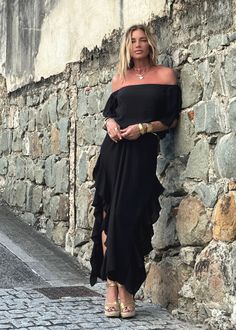 Indulge in the chic style of the Lucy Dress, featuring an off-the-shoulder design, delicate ruffled sleeves, and side seams with romantic ruffles. Modern side openings and a flowing maxi length complete the look. The double-layered body and single layered sleeves create a tantalizing contrast. Elevate your ensemble by pairing it with our Signature belts Elastic on Sleeve 100% Chiffon Lining 100% Chiffon Dry clean or Hand Wash or Delicate Cycle Wash and Hang Dry Designed with love in Miami, FL US Floor-length Off Shoulder Ruffle Dress For Evening, Floor-length Ruffled Off Shoulder Evening Dress, Ruffled Maxi Length Off Shoulder Party Dress, Off-shoulder Ruffled Maxi Dress For Gala, Ruffled Maxi Length Off Shoulder Dress For Party, Elegant One Shoulder Maxi Dress With Ruffle Hem, Elegant Off Shoulder Floor-length Dress With Ruffles, Elegant Floor-length Off Shoulder Dress With Ruffles, Elegant Off-shoulder Floor-length Dress With Ruffles