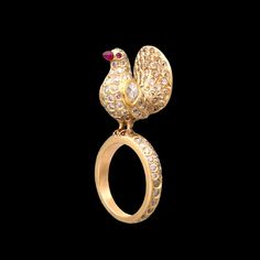 "Pigeon Ring In 18k Gold Ring, Diamond Pigeon Ring, Gold Bird Ring, Bird Engagement Ring, bird Jewelry, Animal Ring, Wedding Gifts  -------------------------------------------------------------------------------------------------------------------------------------------------------------------------- -Gross Weight: 9.180 gms -18kt Gold Ring -Diamond:2.92  -English Polki: 0.36kt - ✔✔On Customer Demand We Offer Certificate Also. ✔✔Our Jewelry Will Not Turn Black. Because It Is Highly Polished. ✔✔ All Our Stones Are Of AAA Quality ✔✔Customer Will Get Same ring As In The Picture. ✔✔We Give Guarantee Of Purity Of Gold and Silver. ✔✔Metal Is Also Available In 925 Sterling Silver, 14K, 18k and 22K Gold ✔✔Free Shipping ✔✔Handcrafted By Ourselves ✔✔Customizations Is Also Available. ✔✔Shipping To W Gold Ring Diamond, Bird Ring, Bird Rings, Animal Ring, Animal Rings, Bird Jewelry, 18k Gold Ring, Ring Diamond, Gold Diamond Rings