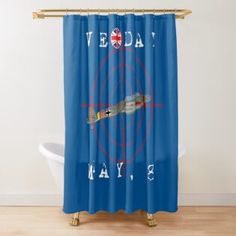 a blue shower curtain with the words vegas and an image of a plane on it