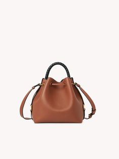 Chloé Marcie Bucket Bag | Chloé US Textured Calf Leather Bucket Bag, Pebbled Leather Bucket Bag With Detachable Strap, Pebbled Leather Bucket Bag, Soft Calf Leather Bucket Bag, Calf Leather Bucket Bag For Travel, Pebbled Leather Tote Bucket Bag With Leather Handles, Pebbled Leather Bucket Bag With Top Handle, Pebbled Leather Top Handle Bucket Bag With Leather Handles, Pebbled Leather Bucket Bag With Removable Pouch