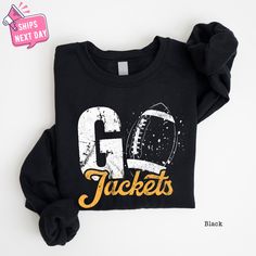 Go Jackets Football Sweatshirt, Game Day Jackets Team Sweater, Jackets School Spirit Wear, Jackets Mascot Football Hoodie,Jackets Sweatshirt Our high-quality sweatshirts and hoodies come in a variety of sizes and colors to suit your needs. If you have any questions or special requests, please don't hesitate to contact us. We hope you enjoy browsing our shop and find something you love! FEATURES * Sizes Offered: Refer to the drop-down menu for available sizes. * Colors: See the drop-down menu and photos for options. * Material: Soft wash cotton-poly blend. * Style: Crewneck Sweatshirt or Hoodie * Care: Machine wash cold, delicate cycle inside out with like colors. Tumble dry low or hang to dry. * Graphic: Professionally printed using leading industry equipment. * Double needle stitched and Fall Team Spirit Hooded Outerwear, School Spirit Long Sleeve Hoodie For Sports Season, School Spirit Hoodie Sweatshirt For Game Day, School Spirit Sports Sweatshirt, Pre-shrunk, Pre-shrunk School Spirit Hoodie For Sports Season, School Spirit Wear, Football Sweatshirt, Spirit Wear, Oversized Sweatshirt