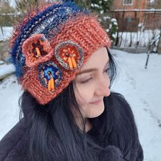 Bohemian style hat, crocheted flowers beanie, Knitted Flower Fairy Hat, Spring Hat Women, Hat color stripes. This is Various textures Hat with colorful stripes knitted from different yarns.  With a unique and funky design, this headwear is adorned with crocheted flowers complemented with beads. This one-of-a-kind Bohemian style hat is perfect for any season. The texture of the hat consists of both, embossed knitting and effect yarns, bouncy, and with fringes.  For my items I use Italian pure mer One Size Crochet Mini Hat For Winter, Whimsical Yarn Mini Hats For Winter, Hand Knitted Crochet Hat For Winter Festivals, Whimsical Winter Yarn Mini Hats, Bohemian Yarn Mini Hats For Winter, Whimsical Yarn Beanie Hat, Whimsical Hand Knitted Beanie Bonnet, Bohemian Mini Hats For Winter, Whimsical Hand-knitted Beanie Bonnet