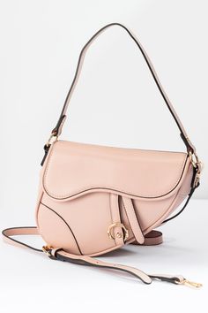 Smooth Shaped Shoulder Crossbody Bag - Pink | Swank Boutique Pink Shoulder Bag With Mobile Phone Pocket For On-the-go, Pink Crossbody Satchel With Adjustable Strap, Pink Crossbody Shoulder Bag, Pink Crossbody Shoulder Bag With Adjustable Strap, Chic Pink Saddle Bag For Everyday Use, Pink Flap Shoulder Bag With Adjustable Strap, Pink Shoulder Flap Bag With Adjustable Strap, Pink Satchel Flap Bag For Travel, Trendy Pink Flap Bag With Mobile Phone Holder