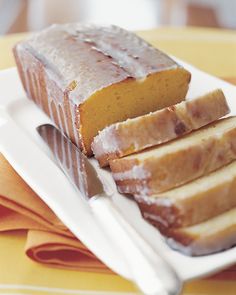 slices of pound cake on a plate with a knife