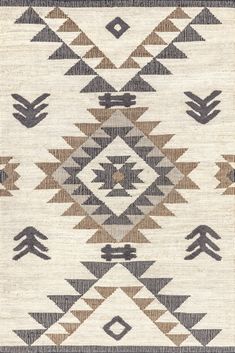 an old navajo rug with brown and white designs on the front, black and tan accents