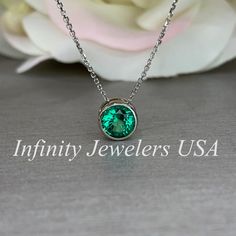 Emerald floating pendant, bezel set emerald necklace 14k white gold ,18 inch diamond cut cable chain #5935 #BridalSet #GiftForHer #AnniversaryGift #GiftsForHer #BridalGift #BridalJewelry #BirthdayGift #FloatingNecklace #TravelNecklace #NecklaceGift Emerald Necklace With Bezel Setting For Anniversary, Anniversary Emerald Necklace With Round Pendant In White Gold, Anniversary Emerald Necklace With Bezel Setting, White Gold Emerald Necklace With Round Pendant For Anniversary, Anniversary White Gold Emerald Necklace With Round Pendant, Fine Jewelry Emerald Necklace With Bezel Setting For Anniversary, Round Bezel Set Emerald Necklace For May Birthstone, Emerald Necklace With Round Pendant For May Birthstone, Round Emerald Necklace With Bezel Setting For May Birthstone