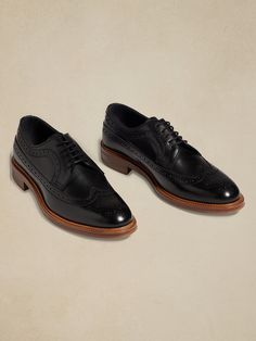 Our traditional long-wing blucher cut from supple Italian calf-skin leather.  This pair is outfitted with an antique storm welt, mounted on a rubber sole.  Details include intricate broguing, a medallion toe, and an iconic silhouette that have remain Timeless Leather Lace-up Shoes With Brogue Detailing, Timeless Wingtip Oxford With Leather Sole, Classic Oxford Shoes With Brogue Detailing, Timeless Wingtip Oxford With Goodyear Welt, Timeless Goodyear Welted Wingtip Oxford, Classic Brogue-detailed Oxford Shoes For Semi-formal Occasions, Classic Brogue Oxford Shoes For Semi-formal Occasions, Classic Wingtip Oxford With Rubber Sole, Timeless Wingtip Oxford For Derby