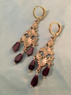 Small GARNETS Chandelier, Brass and Gold earrings, Pair of reproduction 19th century chandelier EARRINGS, teardrop shaped real GarnetsVictorian reproduction Chandelier earrings - these lovely chandelier style reproduction earrings are made with tiny Real GARNET teardrop dangles, mounted on gold brass chandelier and finished with 16k gold plated brass LOOPS with a lovely soft close. These lovely chandelier earrings have three beautiful red real GARNET dangles on each chandelier, that gently swing Victorian Gold Chandelier Earrings In Brass, Antique Dangle Chandelier Earrings For Formal Occasions, Antique Formal Dangle Chandelier Earrings, Antique Chandelier Earrings For Formal Occasions, Victorian Chandelier Dangle Earrings For Formal Occasions, Victorian Chandelier Earrings For Formal Occasions, Yellow Gold Teardrop Chandelier Earrings In Brass, Victorian Dangle Earrings For Formal Occasions, Antique Brass Chandelier Earrings