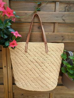 Beige Crochet Tote Bag For Beach, Beige Crochet Tote Bag For The Beach, Beachy Crochet Bag With Woven Natural Fiber, Vacation Woven Rattan Crochet Bag, Vacation Crochet Rattan Bag, Beachy Crochet Bag Made From Natural Fiber, Everyday Braided Rattan Crochet Bag, Vacation Basket Crochet Bag In Natural Fiber, Natural Jute Crochet Bag For Beach Season