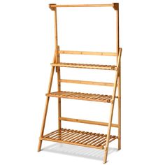 a bamboo shelf with three shelves on each side and one shelf above the other, in front of a white background