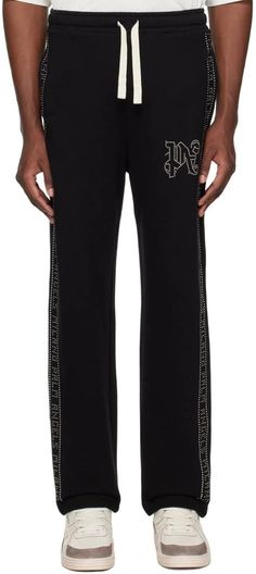 Palm Angels.Black Studded Sweatpants.French terry sweatpants..· Drawstring at elasticized waistband.· Three-pocket styling.· Studded logo detailing at front and outseams.Supplier color: Black gunmetal.100% cotton..Made in Italy..241695M190004 Angel Man, Clothing Pants, Palm Angels, Personal Shopping, French Terry, Men's Clothing, Sweatpants, Mens Outfits, Italy