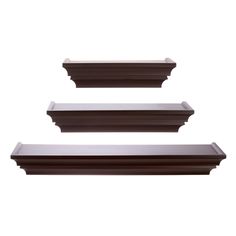 three brown shelfs are stacked on top of each other