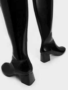 Turn heads wherever you go with these bold and outstanding knee-high boots. The luxurious patent finish will exude a glamorous shine that is impossible to miss, while the understated stitch trims add a touch of understated elegance to the design. The 5.5cm block heels offer a boost in height without compromising comfort. Plus points for the back zips that make putting them on a breeze. Covered rounded toe Block heel Back zip closure Jersey lining Material: Faux leather Heel height (cm): 5.5 Faux Leather Heels, Charles Keith, Understated Elegance, To Miss, Knee High Boots, High Boots, Knee Boots, Black Boots, Knee High