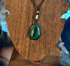 Beautiful large teardrop Malachite necklace. Polished stone with beautiful greens all through out. Malachite is a very powerful stone, great for protecting in the spiritual world, as well as manifestation energy. Spiritual Malachite Necklace For Healing, Healing Malachite Gemstone Necklace, Spiritual Malachite Jewelry For Healing, Spiritual Malachite Pendant Necklace, Spiritual Gemstone Teardrop Pendant Crystal Necklaces, Spiritual Teardrop Gemstone Crystal Necklace, Spiritual Malachite Gemstone Beads Necklace, Green Oval Pendant Amulet Necklace, Spiritual Teardrop Pendant Crystal Necklaces With Natural Stones