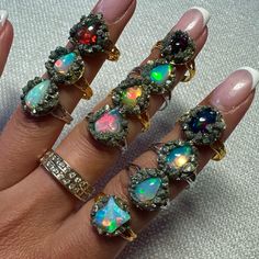 Price Is For One. New Genuine, Natural, High Grade Ethiopian Opals In Pyrite Sand. Fits Size 7 Best But Are Adjustable. Gold And Silver Available. The Opals Range From White Fire, Black Fire, Ovals, Nuggets, Tear Drop And Triangle Shape. Please Message Me After You Order To Let Me Know If You Prefer A Certain Ring Style. Otherwise The Ring Will Be Chosen At Random. Fire Opal Ring Opal Auctions, Spirtual Rings, Antique Jewelry Opal, Fire Opal Engagement Ring Opal Auctions, Witchy Rings Jewelry, Unique Hippie Rings, Opal Crystal Jewelry, Glowing Crystal Ring, Natural Fire Opal Ring