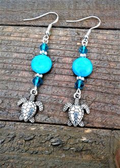 "Sea Turtle Earrings Beach Earrings Blue Jasper Turtle Earrings Sea Turtle Charm Jewelry Nautical Earrings Ocean Sea Life Earrings Handmade Earrings These cute Summer Fun \"Blue Jasper Turtle Earrings\" are a sure to please for the season.  The Tibetan Silver Sea Turtle Charms are adorable, light weight and easy to wear!  If you love the ocean and like wearing Nautical jewelry these earrings are for you.  A must have for all of you Sea Turtle Lovers out there *They are made 10 mm Natural Blue Ja Dangle Earrings With Ear Wire For Vacation, Blue Dangle Earrings With Ocean-inspired Style, Ocean-inspired Blue Dangle Earrings, Dangle Earrings For The Beach, Nickel-free Dangle Earrings For Vacation, Nickel Free Dangle Earrings For Vacation, Nickel-free Drop Earrings For Vacation, Pierced Dangle Earrings For Beach, Adjustable Drop Earrings For Vacation